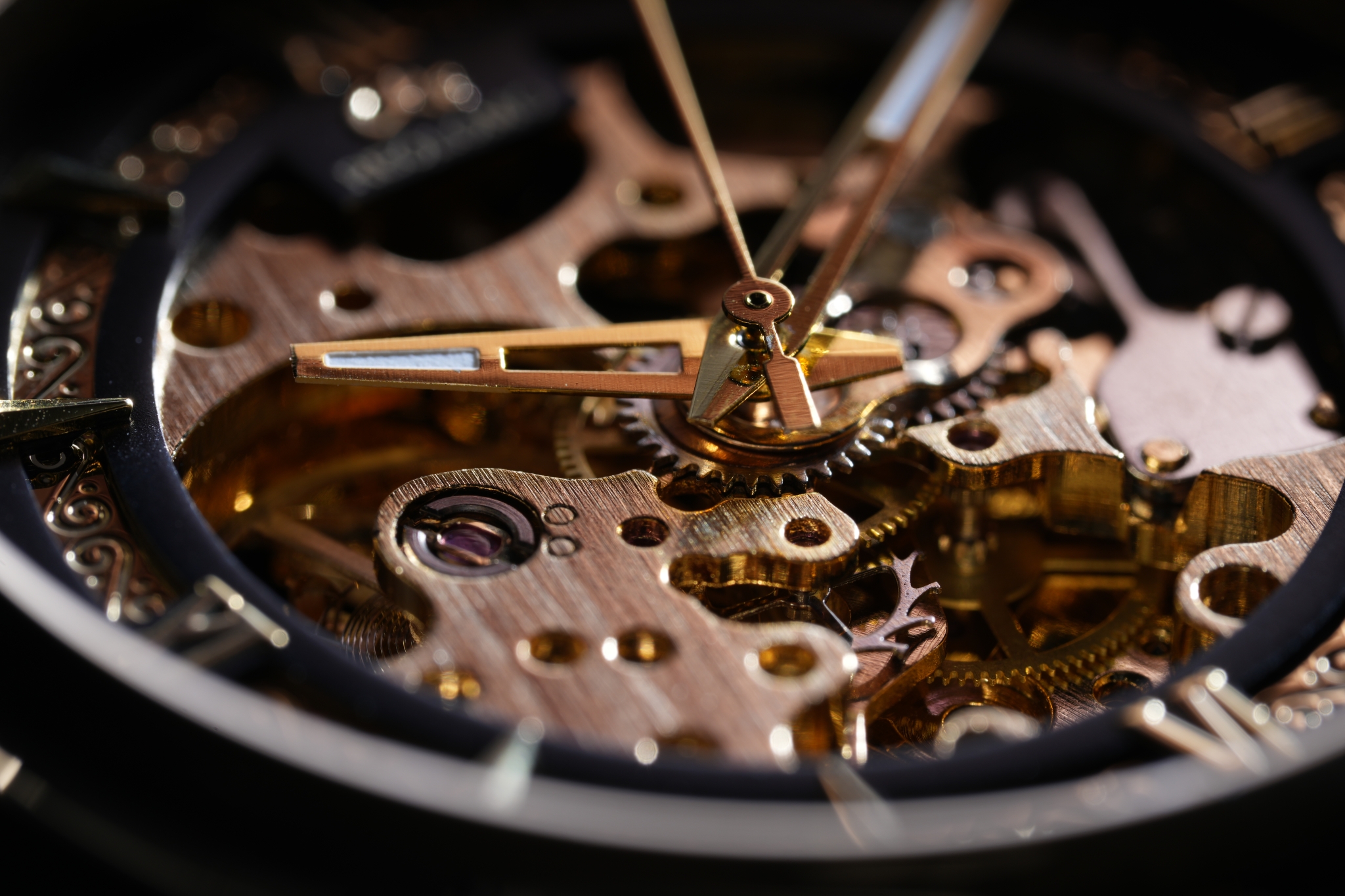 Close-up of a bronze-colored watch Click to open modal