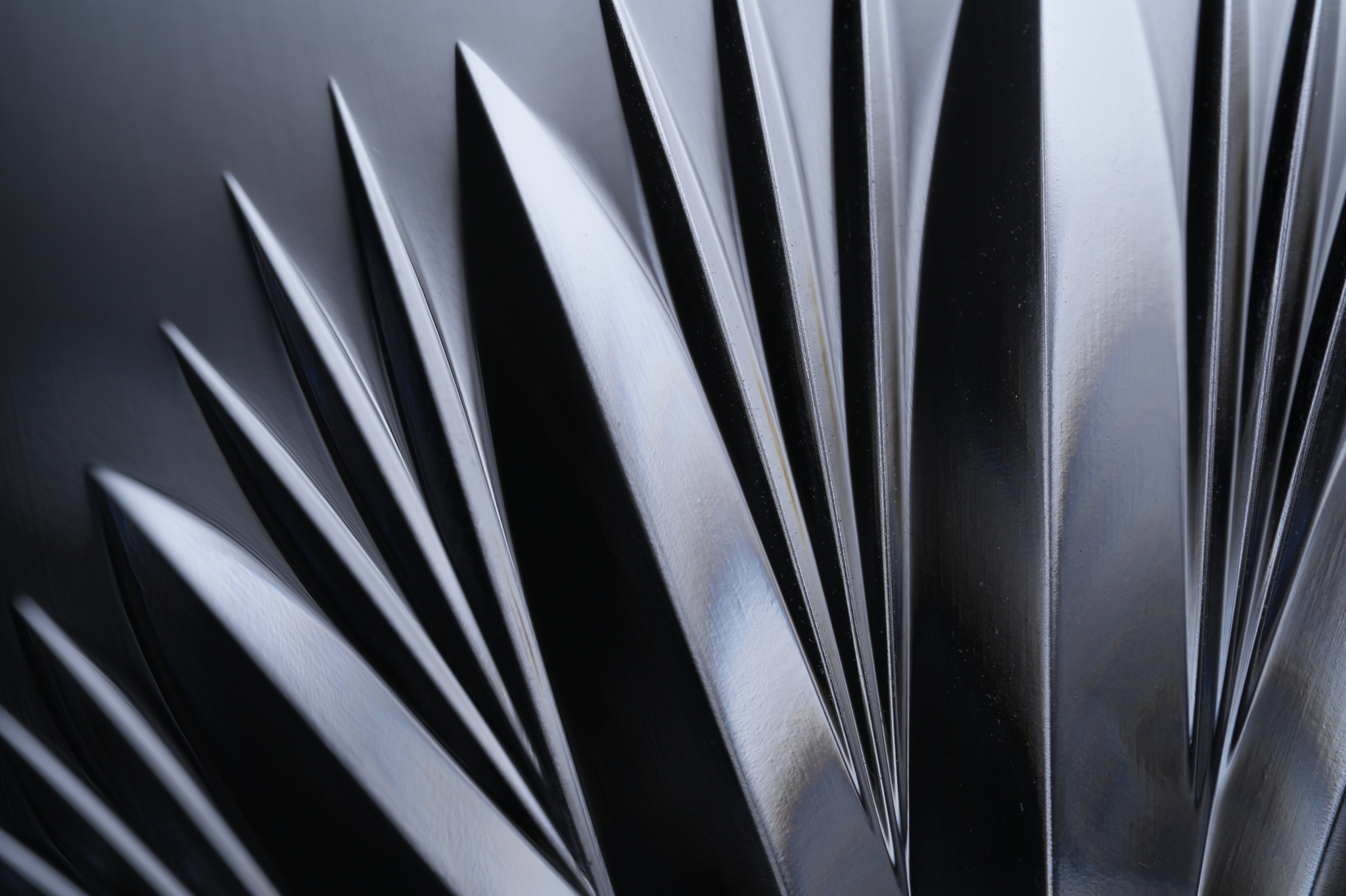 Close-up of the surface design of a glass cup Click to open modal