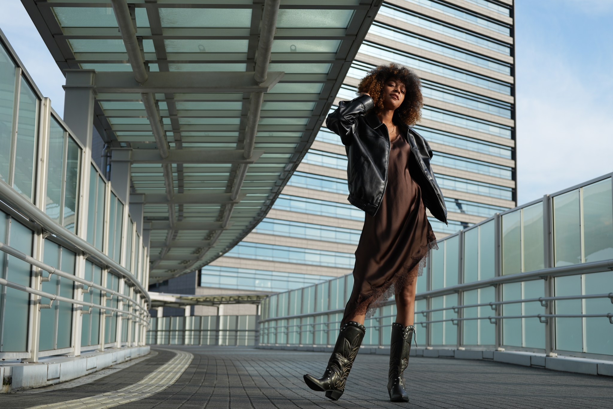 A portrait of a woman in Odaiba city Click to open modal