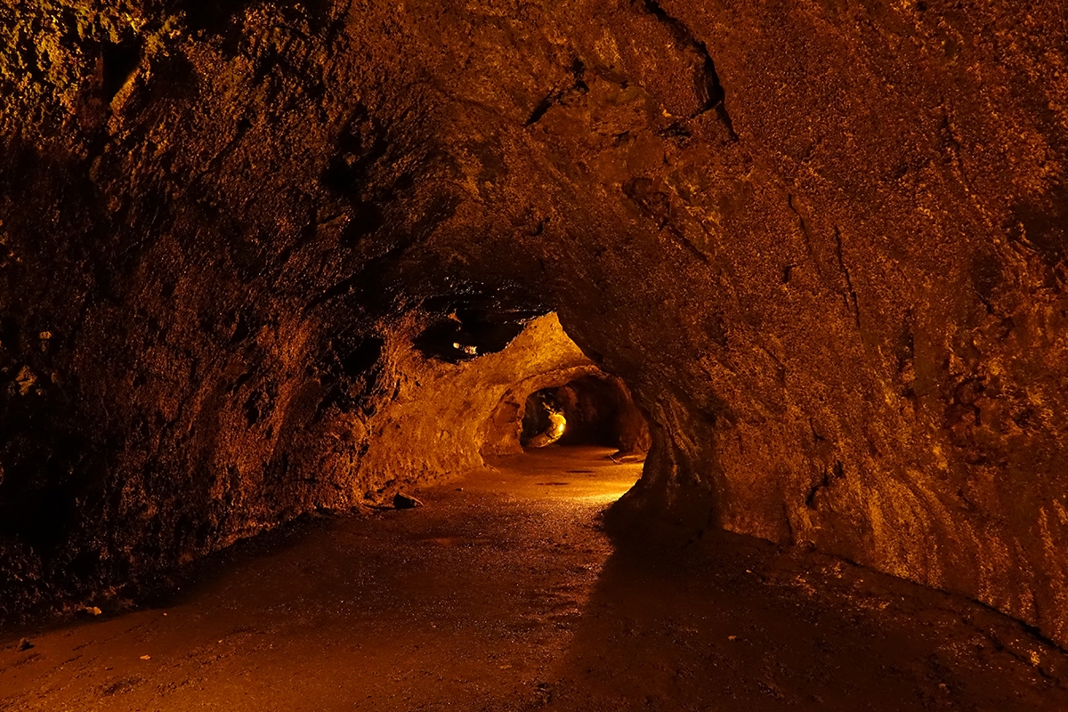 Interior of cave in red rock Click to open modal