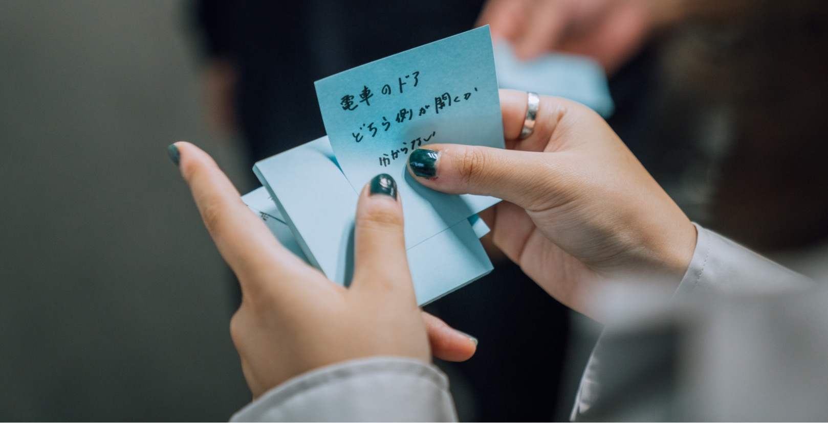 A graph with X and Y axis and many sticky notes