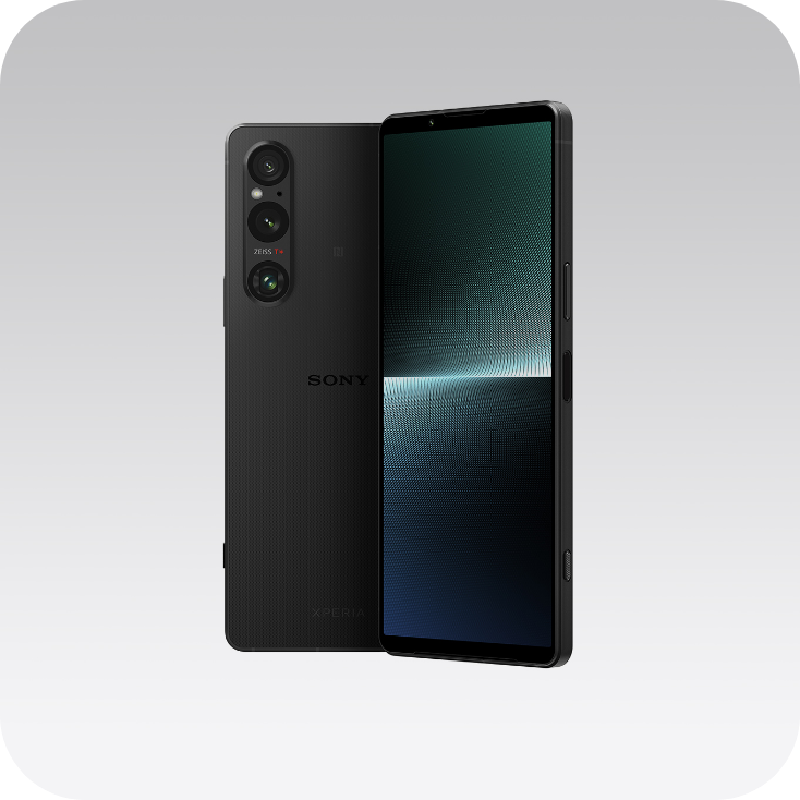 Two smartphones (Xperia) are side by side. On the left, the camera lens can be seen on the back. On the right, the LCD screen is projected on the surface.