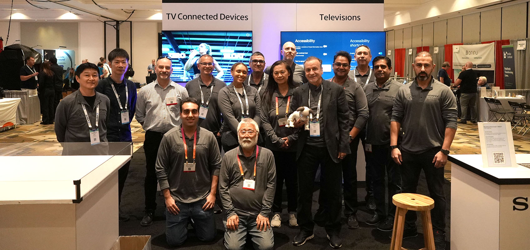 Group photo of Sony employees at the Sony booth at the CSUN conference.